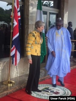 Theresa May et le président nigérian Mohammed Buhari, le 29 août 2018. (VOA/Hausa)