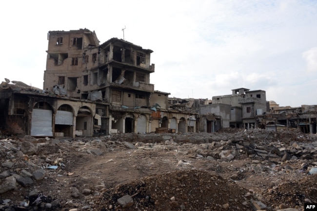A picture taken Nov. 7, 2018, shows damaged buildings in Mosul, Iraq. Iraqi forces announced the "liberation" of the country's second city in July 2017, after a bloody nine-month offensive to end the Islamic State group's three-year rule there.