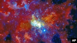 An image released by NASA shows Sagittarius A, the supermassive black hole at the center of the Milky Way Galaxy made from data provided by the Chandra X-ray Observatory, January 2010. (file photo)