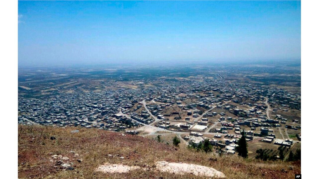 Photo released July 17, 2018 by the Syrian official news agency SANA shows a general view of Tell al-Haara, from the highest hill in the southwestern Daraa province, Syria.