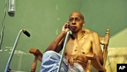 Cuban dissident Guillermo Farinas receives confirmation by mobile phone that he has been awarded the Sakharov Human Rights Prize by the European Parliament, 21 Oct. 2010