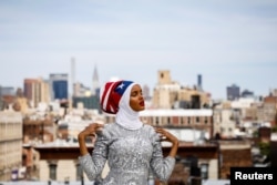 Fashion model and former refugee Halima Aden poses during a shoot at a studio in New York City, Aug. 28, 2017.