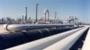 A photo provided by the Energy Department shows crude oil pipelines near Freeport, Texas.