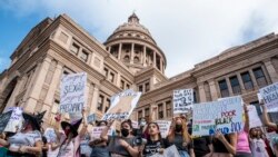 FILE - In this Oct. 2, 2021, photo, protesters take part in the Women's March and Rally for Abortion Justice at the State Capitol in Austin, Texas.