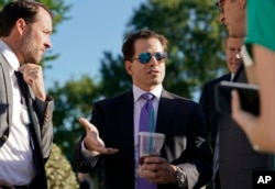 FILE - White House communications director Anthony Scaramucci speaks to members of the media outside the White House in Washington, July 25, 2017.