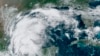 Imagen satelital de la Oficina Nacional de Administración Oceánica y Atmosférica de Estados Unidos (NOAA, por sus siglas en inglés) que muestra la tormenta tropical Nicholas en el golfo de México, el domingo 12 de septiembre de 2021.