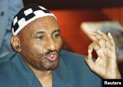 FILE - Ousted Sudanese prime minister Sadeq al-Mahdi addresses a press conference in Nairobi March 5, 1997.