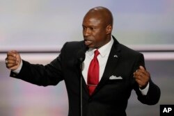Darryl Glenn, Republican candidate for U.S. Senate from Colorado, speaks during the opening day of the Republican National Convention in Cleveland, July 18, 2016.
