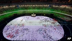 Athletes are introduced during the opening ceremony at the Olympic Stadium at the 2020 Summer Olympics, Friday, July 23, 2021, in Tokyo. (AP Photo/Morry Gash)