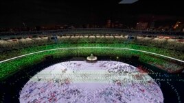 Athletes are introduced during the opening ceremony at the Olympic Stadium at the 2020 Summer Olympics, Friday, July 23, 2021, in Tokyo. (AP Photo/Morry Gash)