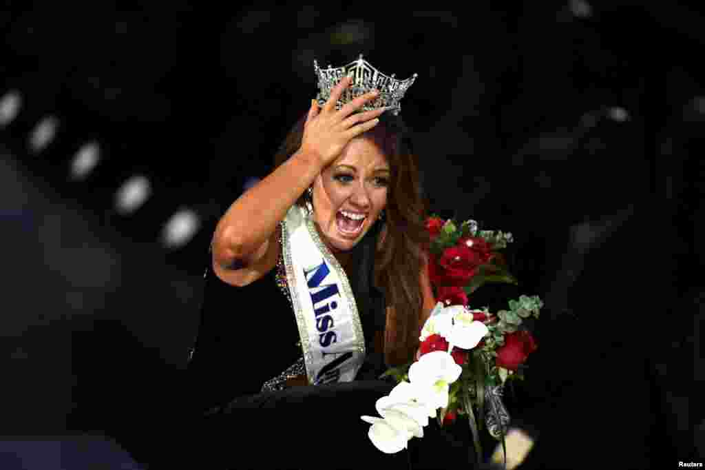 Miss North Dakota Cara Mund reacts after being announced as the winner of the 97th Miss America Competition in Atlantic City, New Jersey, Sept. 10, 2017.