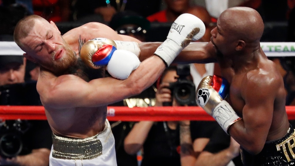 Një ndeshje e fortë boksi: Mayweather mund McGregorin