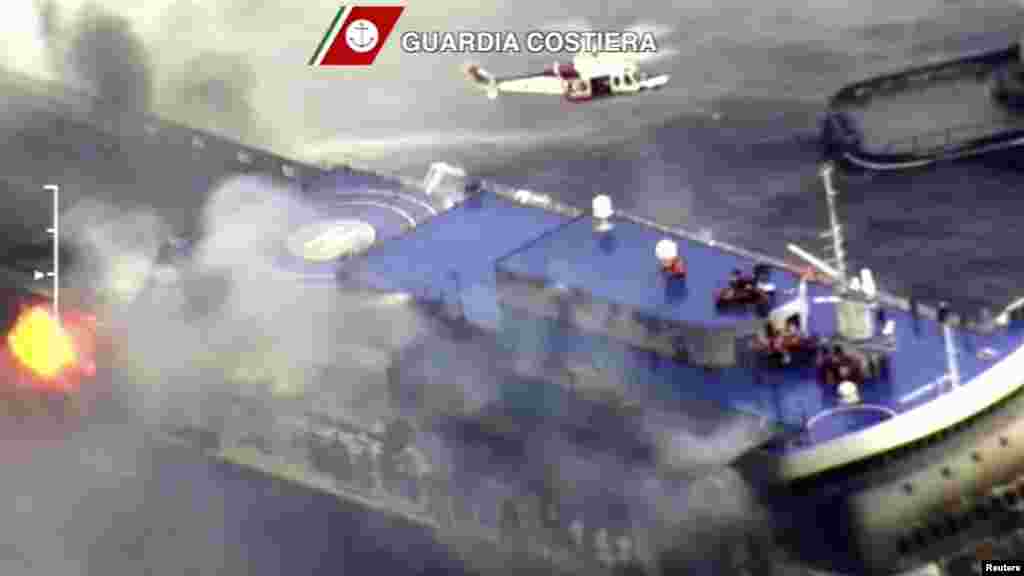 The car ferry Norman Atlantic burns in waters off Greece in this handout video grab of the Italian Coast Guard, December 28, 2014.