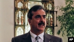Pakistan's Prime Minister Yusuf Raza Gilani speaks during an interview with Reuters at his residence in Islamabad, Pakistan, September 27, 2011.