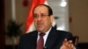 Iraq's Prime Minister Nuri al-Maliki speaks during exclusive interview with Reuters, in Baghdad, Jan. 12, 2014.