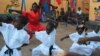 Children learn kung fu in hopes of becoming an action star, Kampala, Uganda, Oct. 9, 2014. 