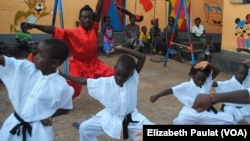 Children learn kung fu in hopes of becoming an action star, Kampala, Uganda, Oct. 9, 2014. 