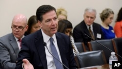 FBI Director James Comey testifies on Capitol Hill in Washington, March 26, 2014, before a House Appropriations, Commerce, Justice, Science, and Related Agencies subcommittee hearing.