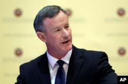 FILE - U.S. Navy Adm. William McRaven addresses the Texas Board of Regents, in Austin, Texas, Aug. 21, 2014.