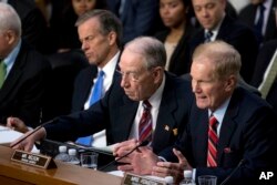 FILE - Sen. Bill Nelson, D-Fla.(R) speaks during joint hearings on Capitol Hill Washington, regarding the use of Facebook data to target American voters in the 2016 election.