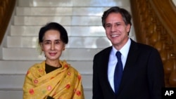 National League for Democracy party leader Aung San Suu Kyi, and U.S. Deputy Secretary of State Antony Blinken are seen following a meeting.
