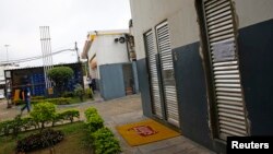 A view of the bathroom doors at the gasoline station where U.S. swimmers Ryan Lochte, Jimmy Feigen, Jack Conger and Gunnar Bentz were accused by staff of having caused damage, in Rio de Janeiro, August 18, 2016.