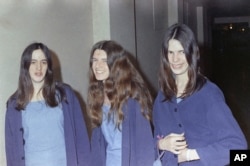 Charles Manson followers, from left: Susan Atkins, Patricia Krenwinkel and Leslie Van Houten, shown walking to court to appear for their roles in the 1969 cult killings of seven people.