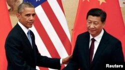 Tổng thống Mỹ Barack Obama và Chủ tịch Trung Quốc Tập Cận Bình tại Sảnh đường Nhân dân ở Bắc Kinh, ngày 12/11/2014.