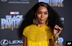 Angela Bassett, a cast member in "Black Panther," poses at the premiere of the film at the El Capitan Theatre, Jan. 29, 2018, in Los Angeles.