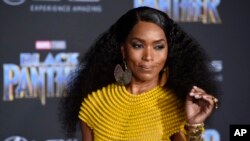 Angela Bassett, a cast member in "Black Panther," poses at the premiere of the film at the El Capitan Theatre, Jan. 29, 2018, in Los Angeles.