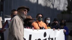 Amos Brown takes part in a demonstration, during a community rally to raise awareness of anti-Asian violence and racist attitudes, outside the Hall of Justice, San Francisco,March 4, 2021.