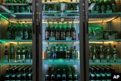 Different types of Taedonggang beer are for sale in a refrigerator at the Taedonggang Brewery in Pyongyang, North Korea, July 26, 2017. The brewery recently added an eighth kind of beer.