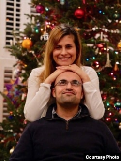 Lilah Salih, a Yazidi woman from a village outside Sinjar in northern Iraq, resettled in the U.S. with her husband in 2017. They are pictured here celebrating Christmas that year.