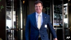 FILE - Paul Manafort , senior aid to Republican Presidential candidate Donald Trump leaves the Four Seasons hotel in New York, after a GOP fundraiser.