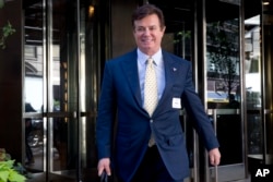 FILE - Paul Manafort, then a senior aide to Republican presidential candidate Donald Trump, leaves the Four Seasons hotel in New York, after a GOP fundraiser, June 9, 2016.