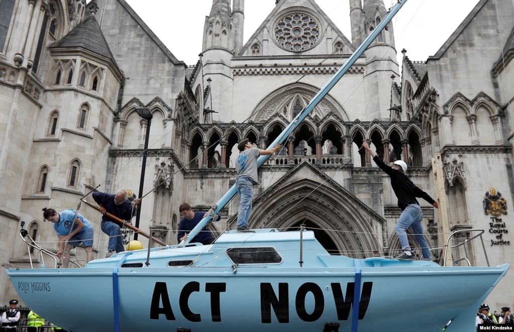  &nbsp;ո Ǽ ۿ ĺȭ ü &lsquo;ݶ(Extinction Rebellion)&rsquo; &#39; ൿ϶(ACT NOW)&#39; Ʈĥ  踦 ġϰ ִ.