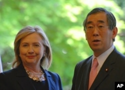 U.S. Secretary of State Hillary Clinton and Japanese Foreign Minister Takeaki Matsumoto, Tokyo, 17 Apr. 2011