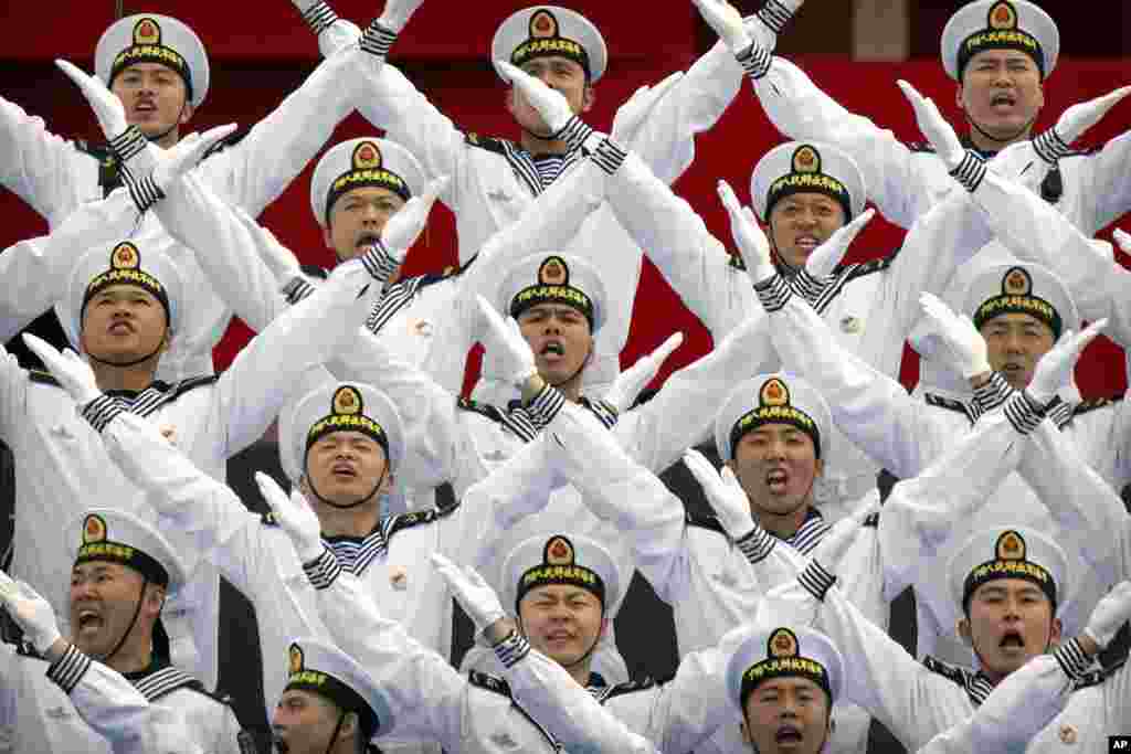 A Chinese navy chorus performs during a concert featuring Chinese and foreign military bands in Qingdao.