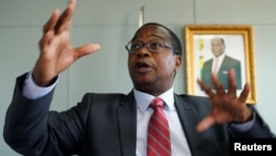 Finance Minister Mthuli Ncube gestures during a media briefing in Harare, Zimbabwe, Oct. 5, 2018. 