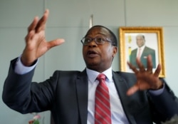 Finance Minister Mthuli Ncube gestures during a media briefing in Harare, Zimbabwe, October 5, 2018