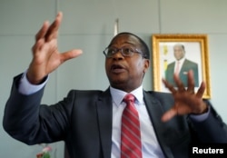 Finance Minister Mthuli Ncube gestures during a media briefing in Harare, Zimbabwe, Oct. 5, 2018.
