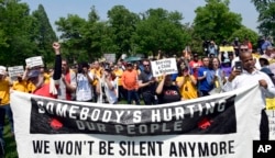 The original 1968 Poor People's Campaign was planned by Martin Luther King. In this image from a 2018 march, people continue to call for economic reforms.