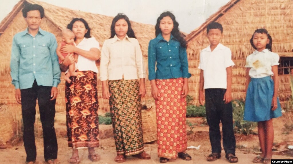 The Mells posed for a family photo in Thailand's Khao I Dang refugee camp. (Courtesy of Sameth Mell)