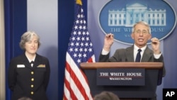 Dr. Anthony Fauci, sirector of NIH/NIAID, right, accompanied by Dr. Anne Schuchat, Principal Deputy Director of the CDC, speaks to the media during the daily briefing in the Brady Press Briefing Room of the White House in Washington, Monday, Feb. 8, 2016. President Barack Obama is asking Congress for more than $1.8 billion in emergency funding to help fight the Zika virus. (AP Photo/Pablo Martinez Monsivais)