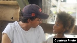 Director Ben Zeitlin and Quvenzhane Wallis on the set of Beasts of The Southern Wild (Photo: Fox Searchlight / Jess Pinkham)