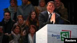 Italian Prime Minister Matteo Renzi speaks during the last rally for a "Yes" vote in the upcoming referendum about constitutional reform, in Florence, Italy, Dec. 2, 2016.