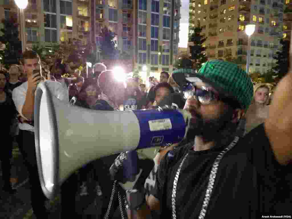 Protesters begin marching in Charlotte, North Carolina, Sept. 22, 2016. Demonstrators marched for a third night in the city, following the police shooting death of an African-American man earlier this week.