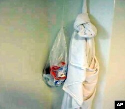 This May 1, 2018, photo from the Department of Homeland Security's Office of the Inspector General shows a noose fashioned from bedsheets in a cell at the Adelanto Detention Center in Adelanto, Calif. The OIG issued a scathing report of the privately run GEO Group detention facility. There were at least seven suicide attempts at the facility between December 2016 and October 2017, and a 32-year-old man killed himself by hanging in March 2017, according to the report.