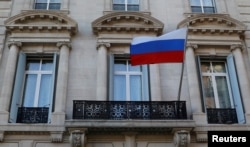 The Russian flag flies on the Consulate-General of the Russian Federation in Manhattan in New York City, March 26, 2018.