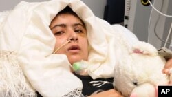 Image released on October 19, 2012, shows Pakistani teenager Yousufzai, who is recovering in Queen Elizabeth Hospital in Birmingham, England, after being shot in the head by Taliban gunmen.